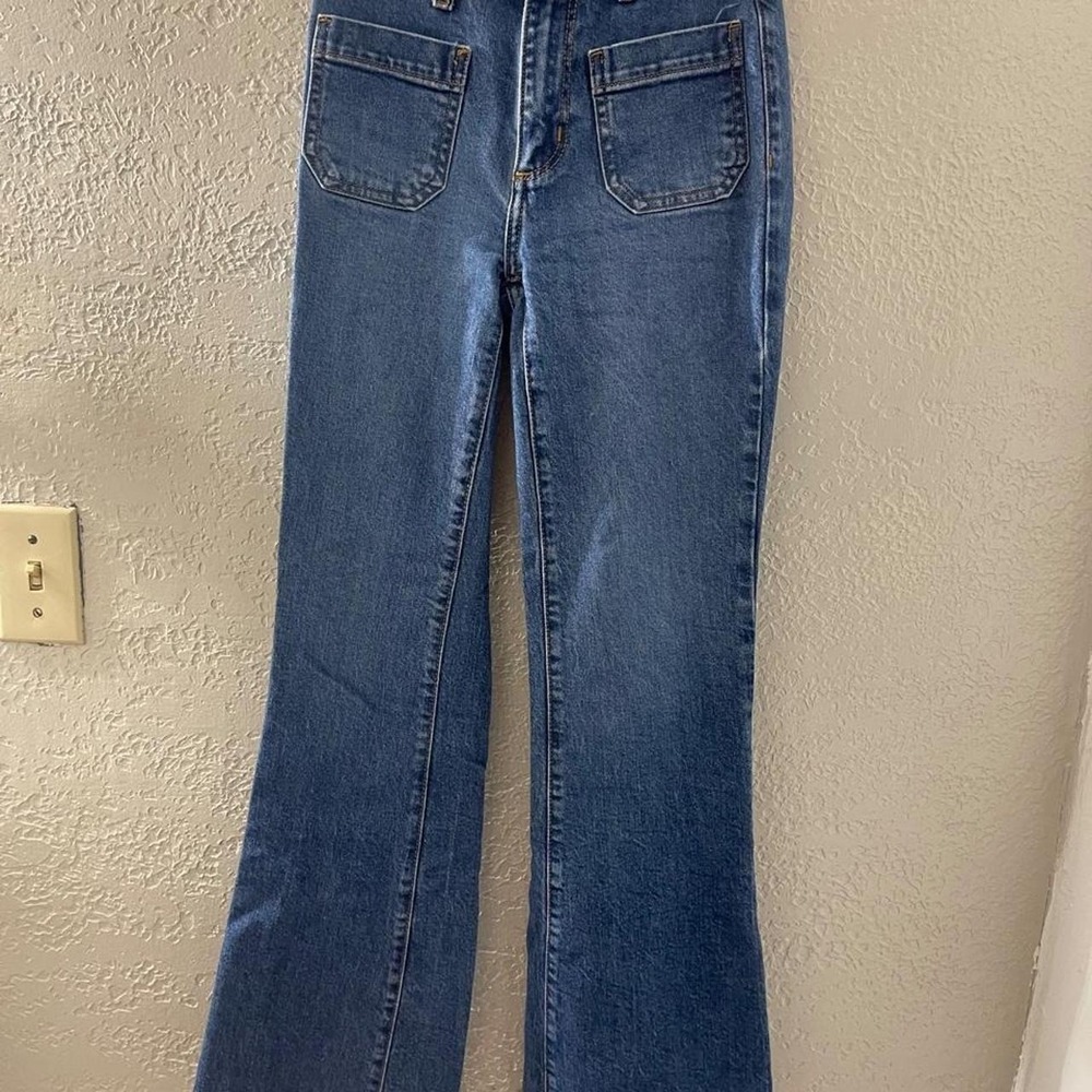 A New Day blue denim jeans high rise with a flared leg Size 00R